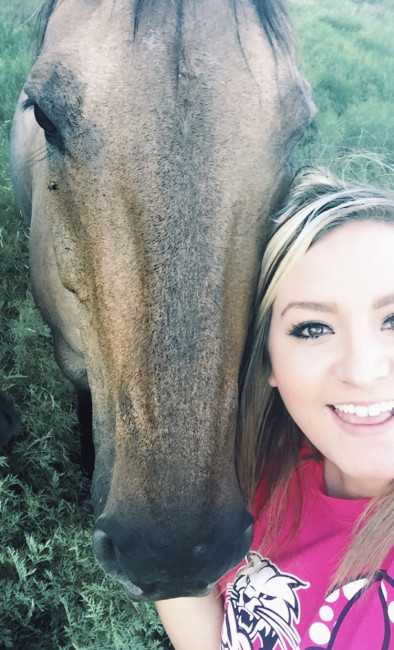 I am sucker for all animals. This is my grandmother's horse . He is so sweet but honestly, he just wanted me to feed him. LOL 