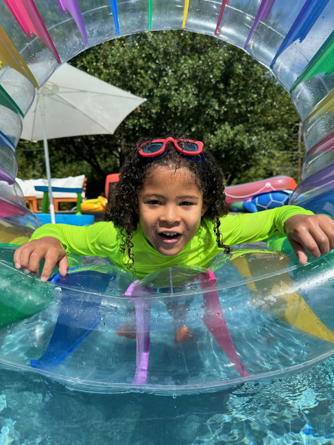 Miles is a fish! He learned to swim without floaties when he was only two, and at five is learning strokes and perfecting his dives. He absolutely loves the water!